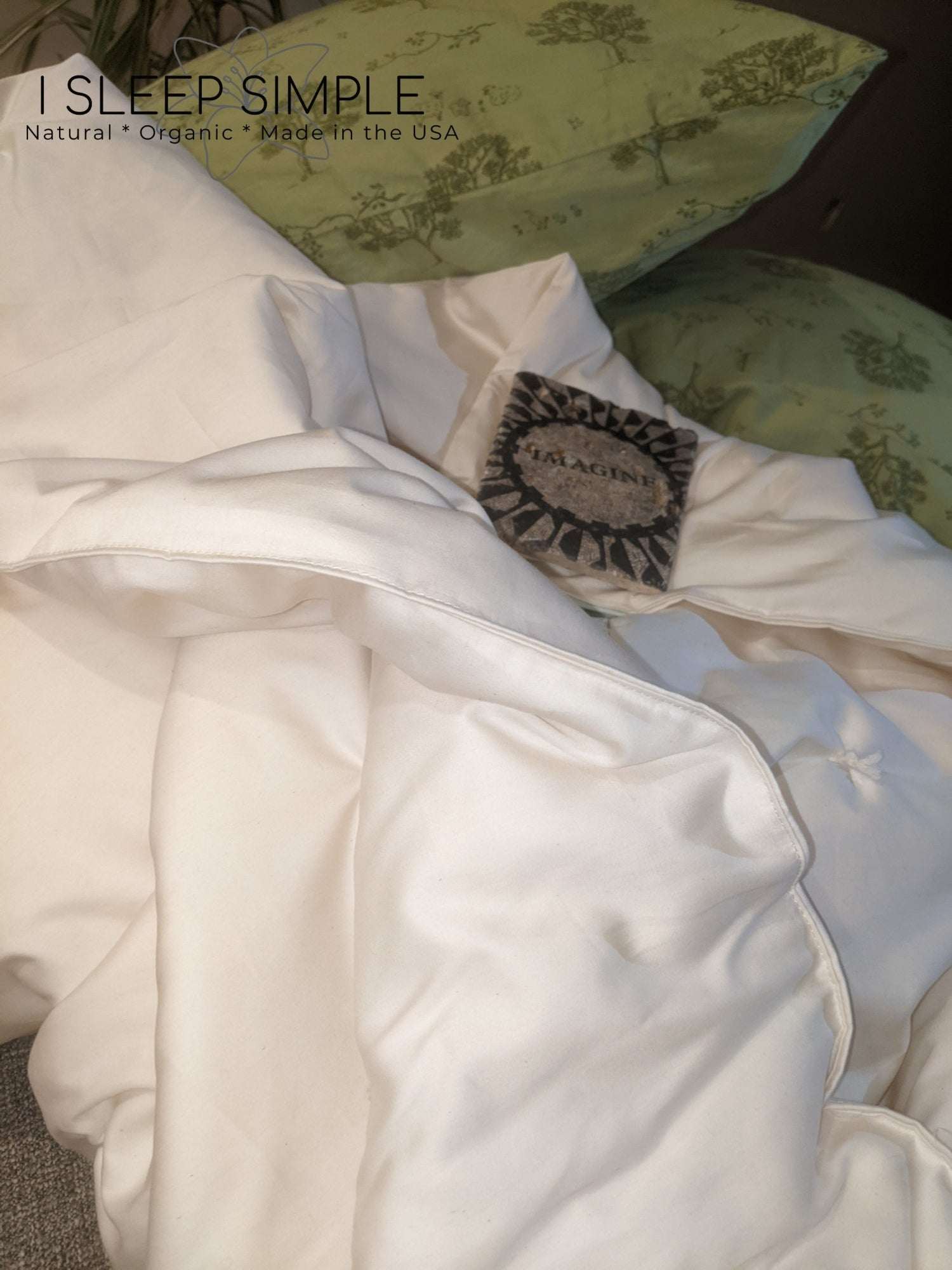 Handmade organic cotton duvet on display, showcasing its soft and eco-friendly fabric.