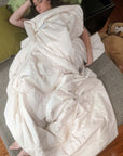 Soft and eco-friendly organic cotton duvet providing comfort for every season, handmade in the USA.