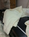 Eco-friendly organic cotton duvet, handmade for all-season comfort, GOTS certified, USA-grown, hypoallergenic bedding.