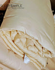 Washable wool duvet made from merino wool with eco-friendly thermal bonding.