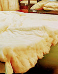 Handmade organic cotton duvet in production, showcasing plush, eco-friendly comfort.