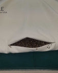 Buckwheat pillow with organic fill and adjustable design for comfort and support.