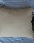 Buckwheat Pillow with organic filling on a bed, promoting natural comfort and support.