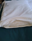 Buckwheat and wool pillow with firm support and soft luxury, eco-friendly and sustainable design.