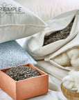Buckwheat and wool pillow showcasing natural materials and design features.