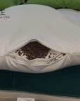 Buckwheat and wool pillow showcasing natural buckwheat hull filling.