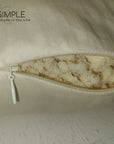 Shredded latex pillow with breathable and supportive natural filling, eco-friendly, hypoallergenic, and made in the USA.