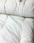 Cotton mattress topper, handmade organic comfort, plush bedding.