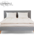 Cotton Mattress Topper on a bed, offering plush, breathable comfort with organic materials, handmade in the USA.