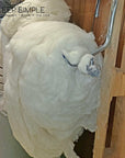 Wool batting roll made from 100% virgin sheep's wool, naturally dust-mite resistant and antimicrobial, ideal for insulation and crafting.