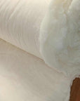 100% virgin wool batting, un-dyed and un-treated, ideal for pillows, duvets, and more.