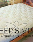FIRM Cotton and Wool Futon MattressThis mattress is considered to be very firm in feel and is hand-made using 100% cotton batting layers and wrapped with wool! Enjoy the breathability of sleeping on tMattressesWool Futon Mattress