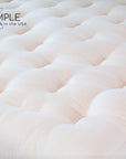 Extra Firm Cotton Mattress with tufted surface, natural and organic, made in the USA.
