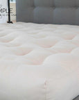 FIRM Cotton and Wool Futon MattressThis mattress is considered to be very firm in feel and is hand-made using 100% cotton batting layers and wrapped with wool! Enjoy the breathability of sleeping on tMattressesWool Futon Mattress