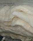 Organic Wool Batting - GOTS certified, natural, breathable, hypoallergenic wool from New Zealand sheep; eco-friendly and durable.