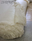 GOTS certified organic wool batting roll, natural and eco-friendly material, ideal for sustainable projects.
