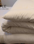 Organic wool mattress topper, natural and eco-friendly, handmade in the USA.