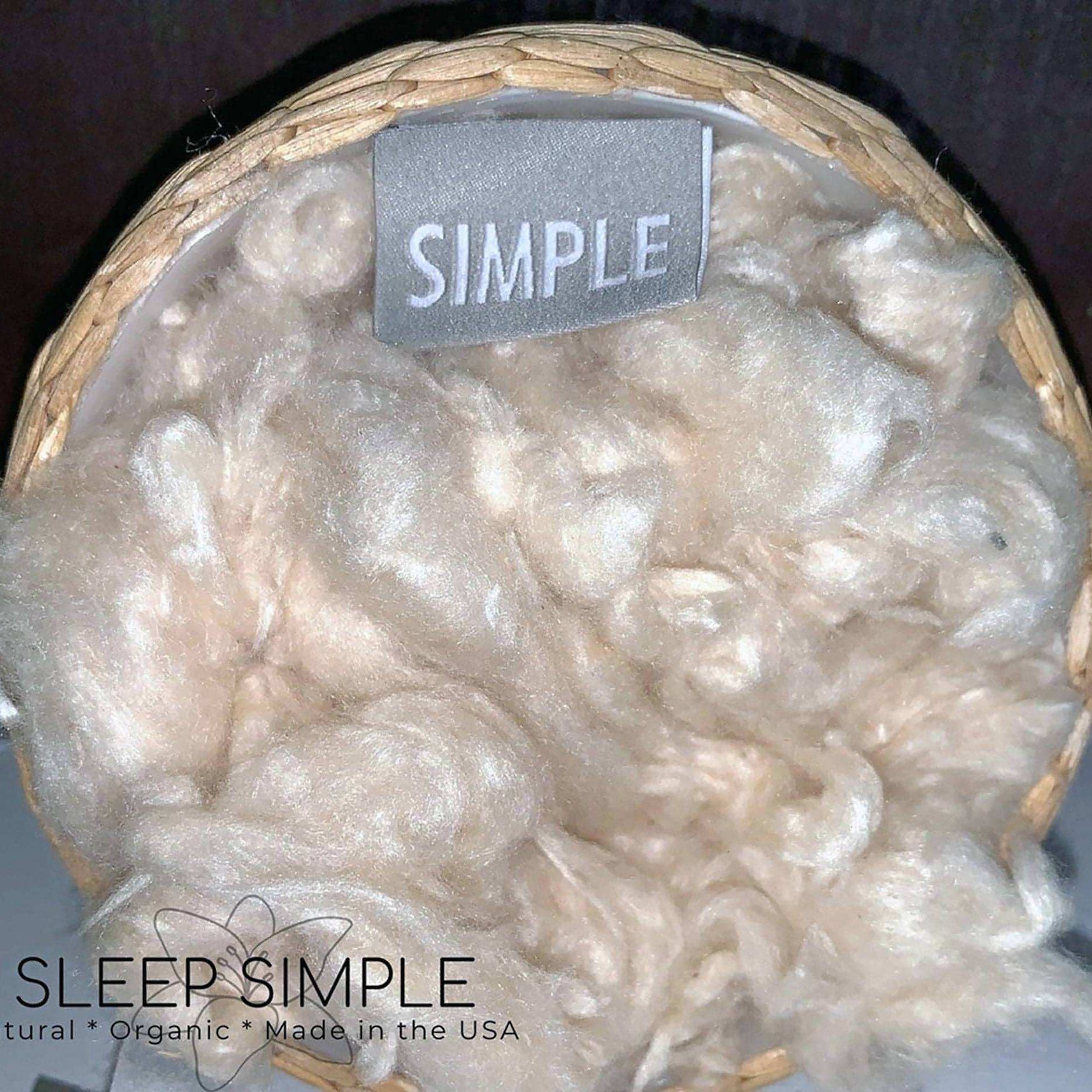 Kapok Fiber in a basket showcasing its natural, silky texture, perfect for eco-friendly, vegan fillings.