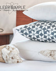 Kapok pillow with organic cotton cover in a bedroom setting, showcasing natural and sustainable filling.