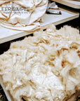Natural kapok fiber filling for eco-friendly pillows and cushions, plant-based and vegan alternative to synthetic material.