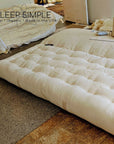 FIRM Organic Cotton and Wool Futon Mattress - GOTS Certified!Simple's firmest all cotton and wool futon mattress is now available in 100% GOTS certified organic cotton and wool, free from any toxins or chemicals. Enjoy the breMattressWool Futon Mattress - GOTS Certified