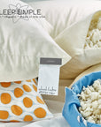 Supportive and breathable shredded latex pillow with natural latex filling, eco-friendly and hypoallergenic, available in multiple sizes.