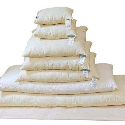 Stack of Best Kapok Pillow in various sizes, showcasing soft, eco-friendly comfort and support.