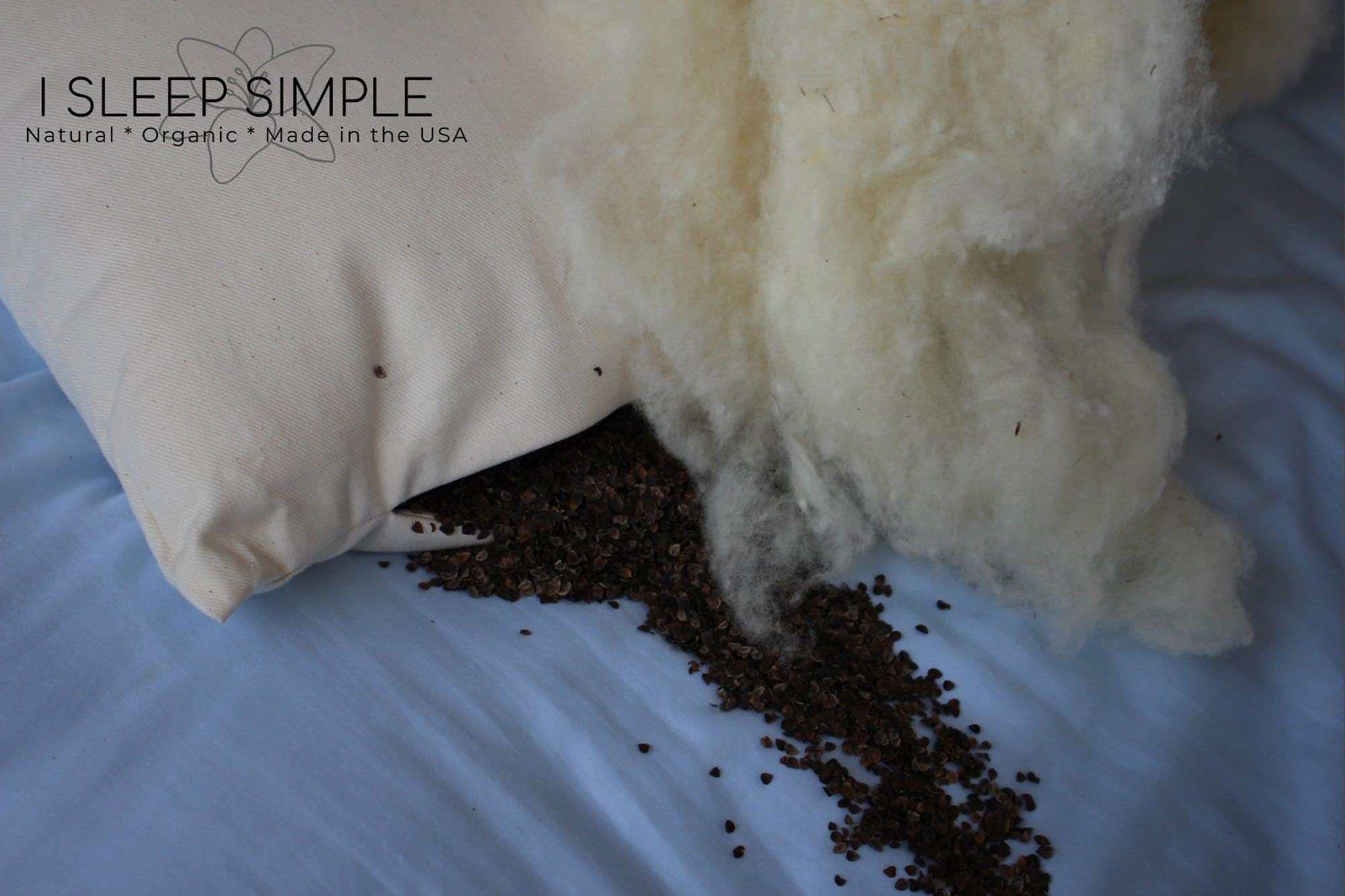 Buckwheat and wool pillow with natural organic fill on a blue background.