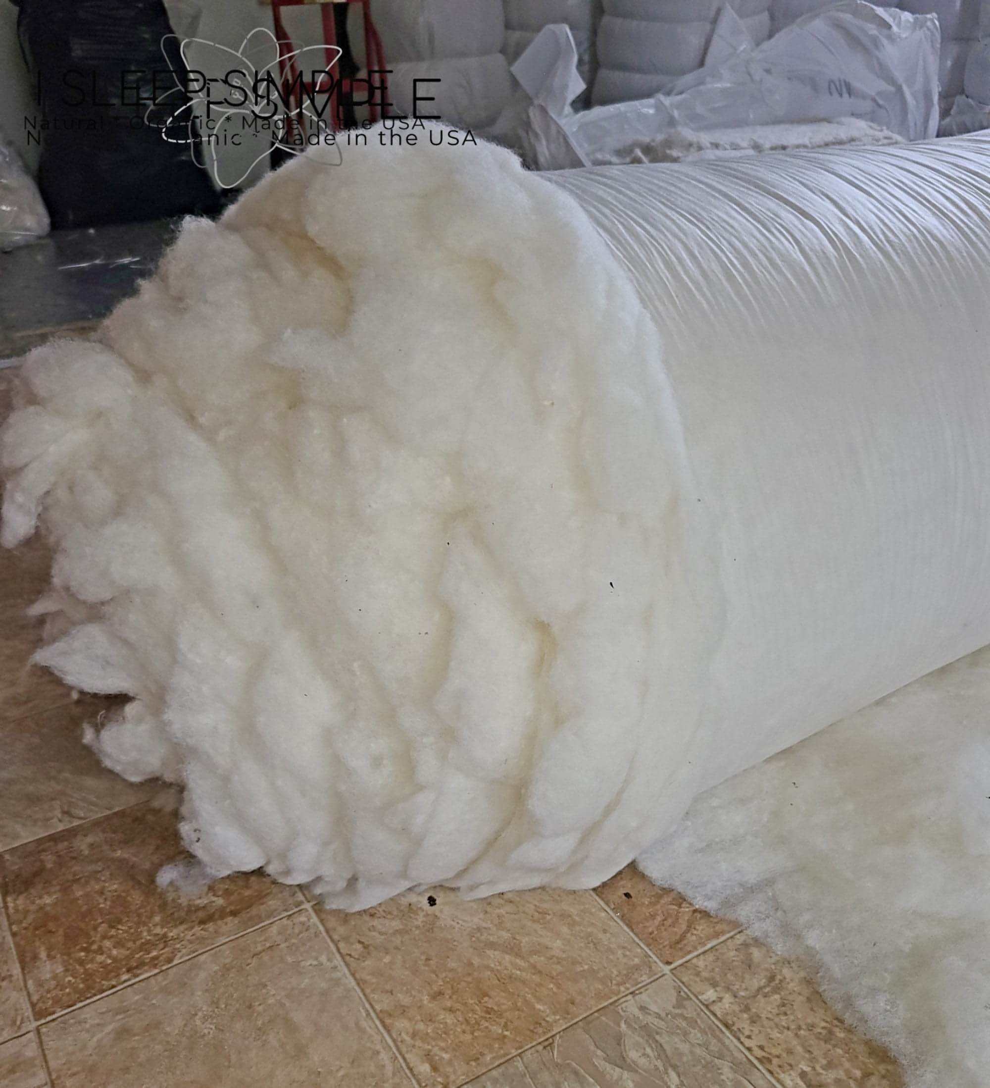 100% virgin wool batting roll, undyed and untreated, perfect for pillows, duvets, and insulation.