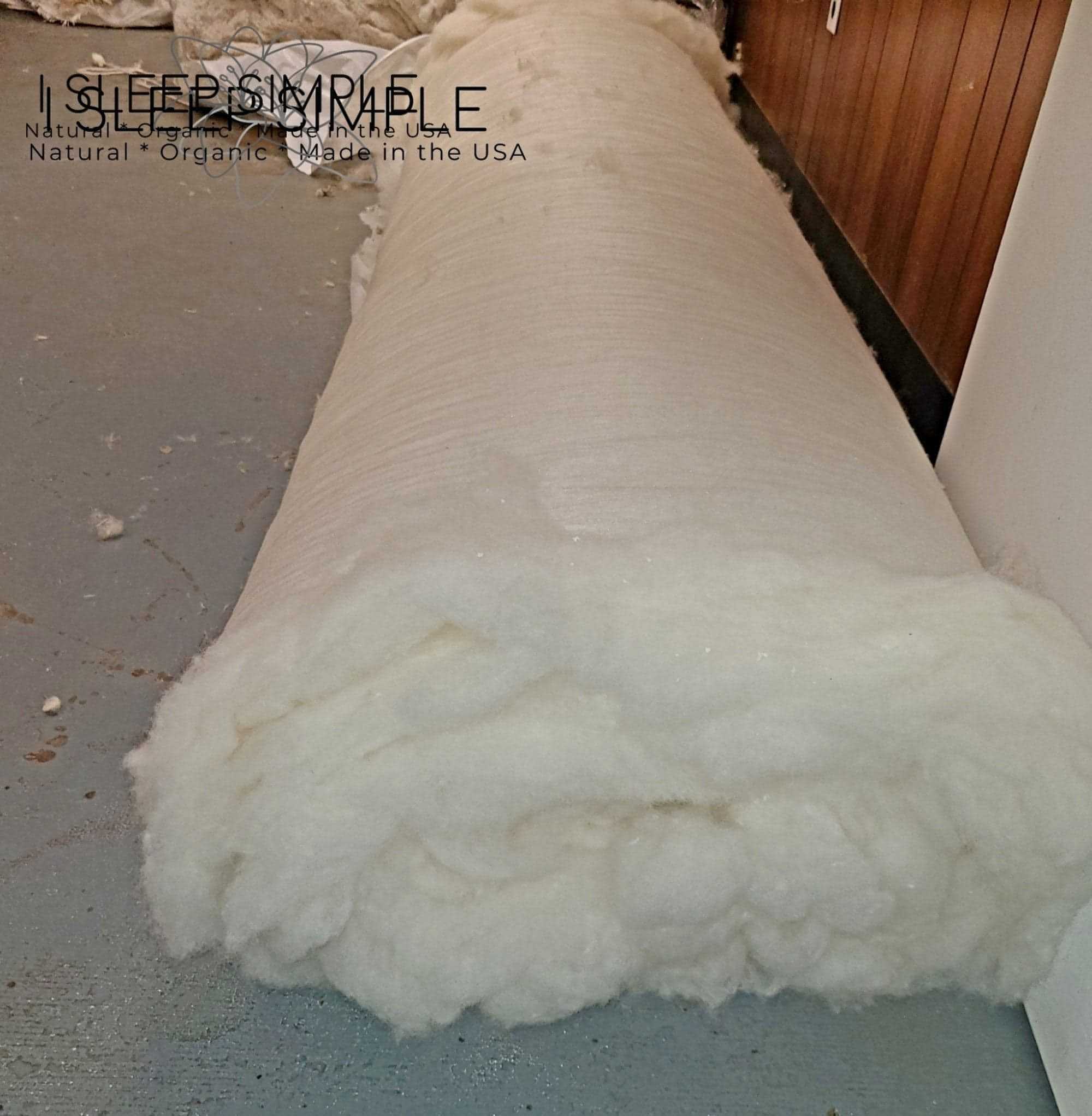 Wool batting roll made from 100% virgin sheep's wool, un-dyed and untreated, ideal for pillows, duvets, and cushions.