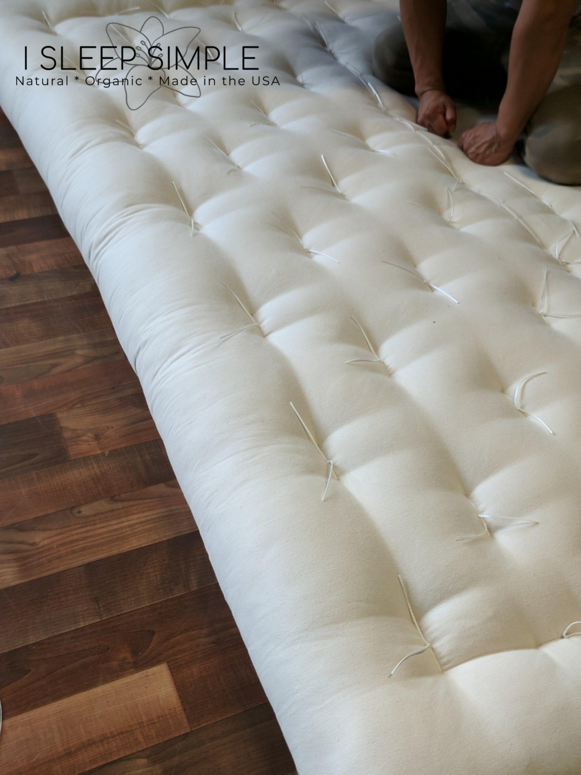 FIRM Cotton and Wool Futon MattressThis mattress is considered to be very firm in feel and is hand-made using 100% cotton batting layers and wrapped with wool! Enjoy the breathability of sleeping on tMattressesWool Futon Mattress