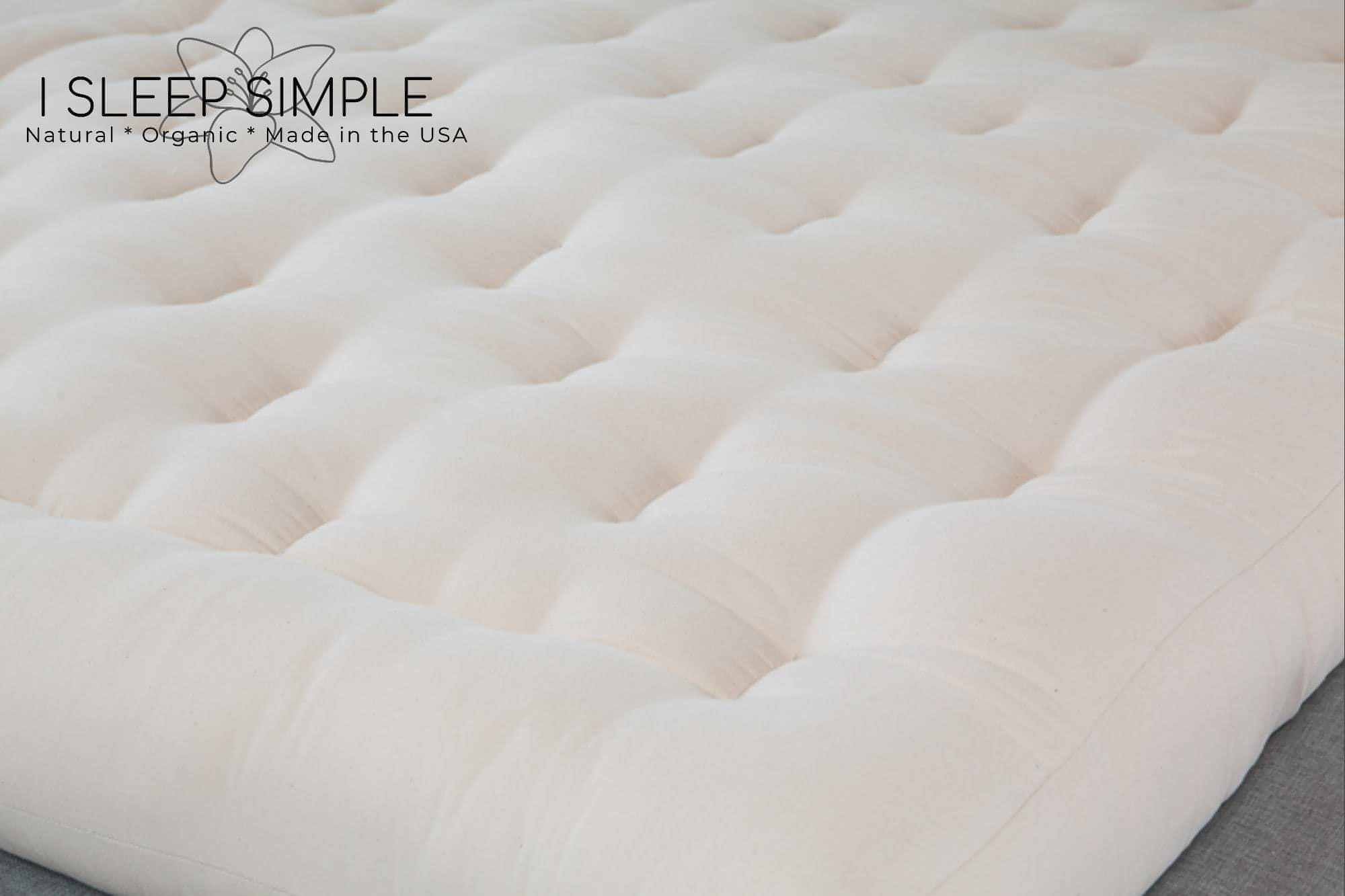 Firm organic cotton and wool futon mattress, GOTS certified, handcrafted, natural fibers, eco-friendly bedding.