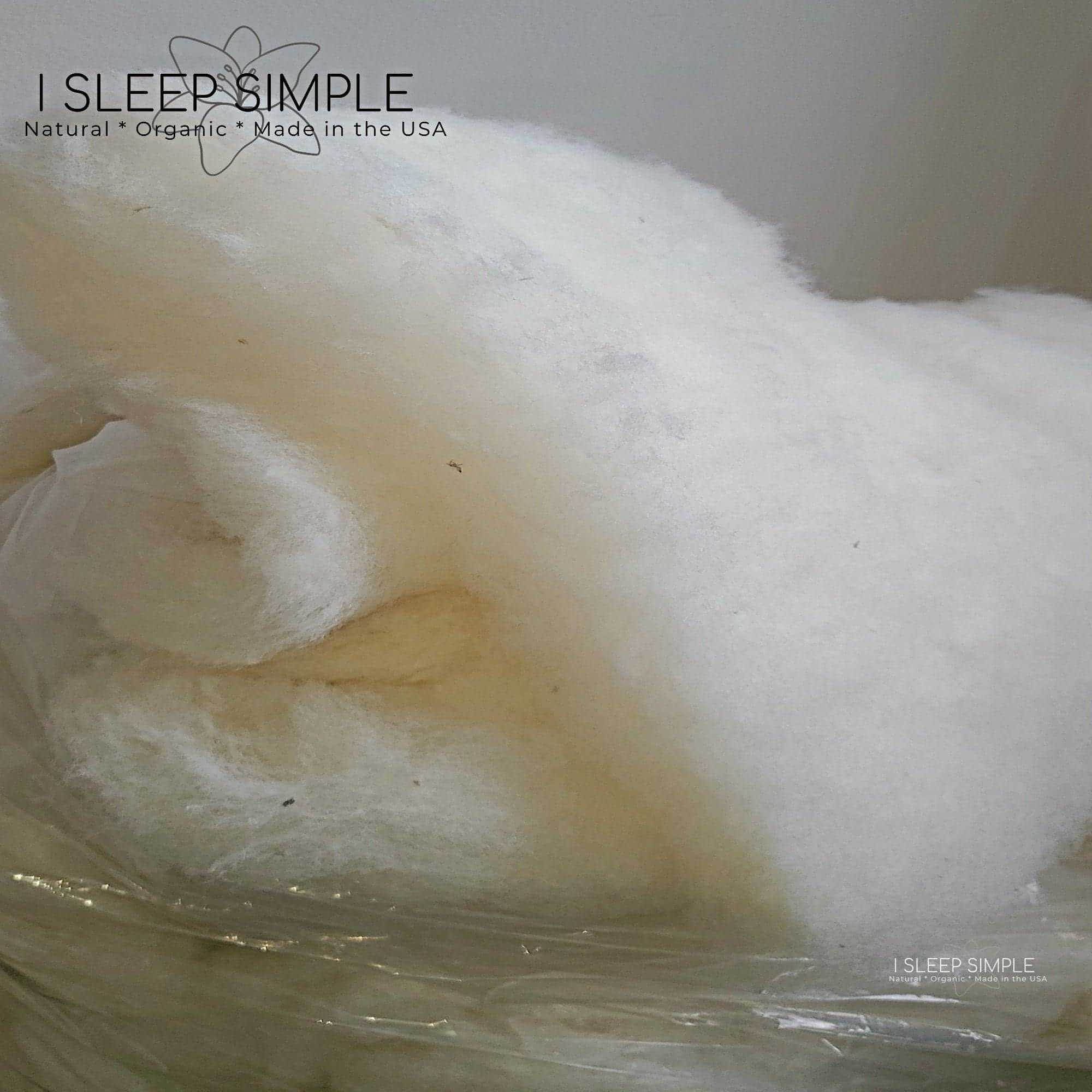 GOTS certified organic wool batting, traceable carded wool, eco-friendly, hypoallergenic, temperature-regulating.