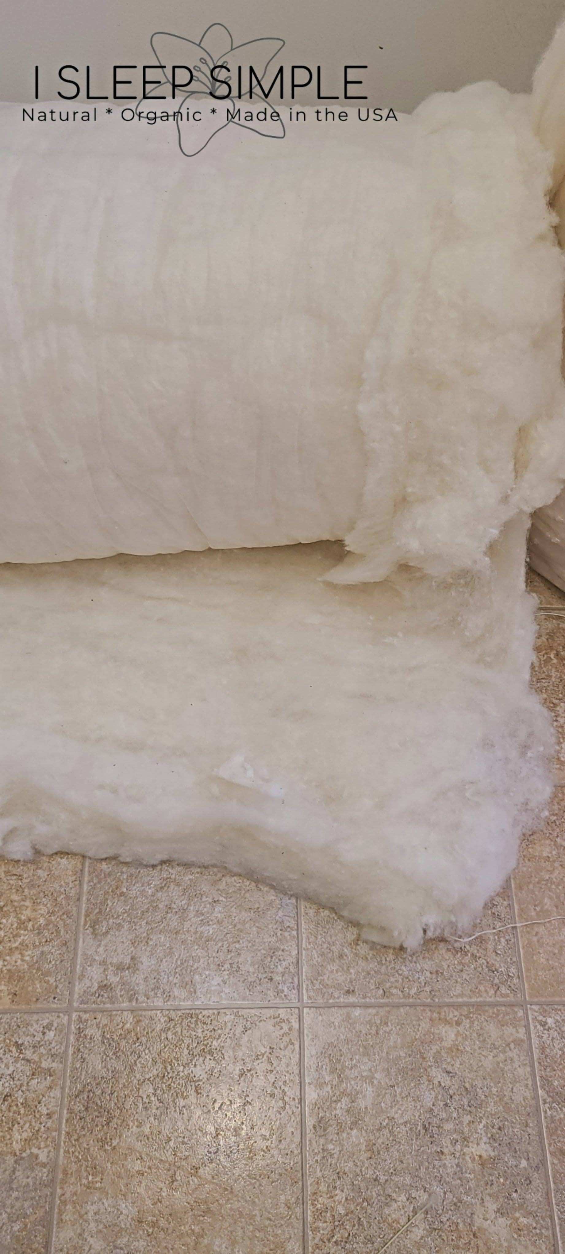Organic wool batting roll for crafting and insulation projects.