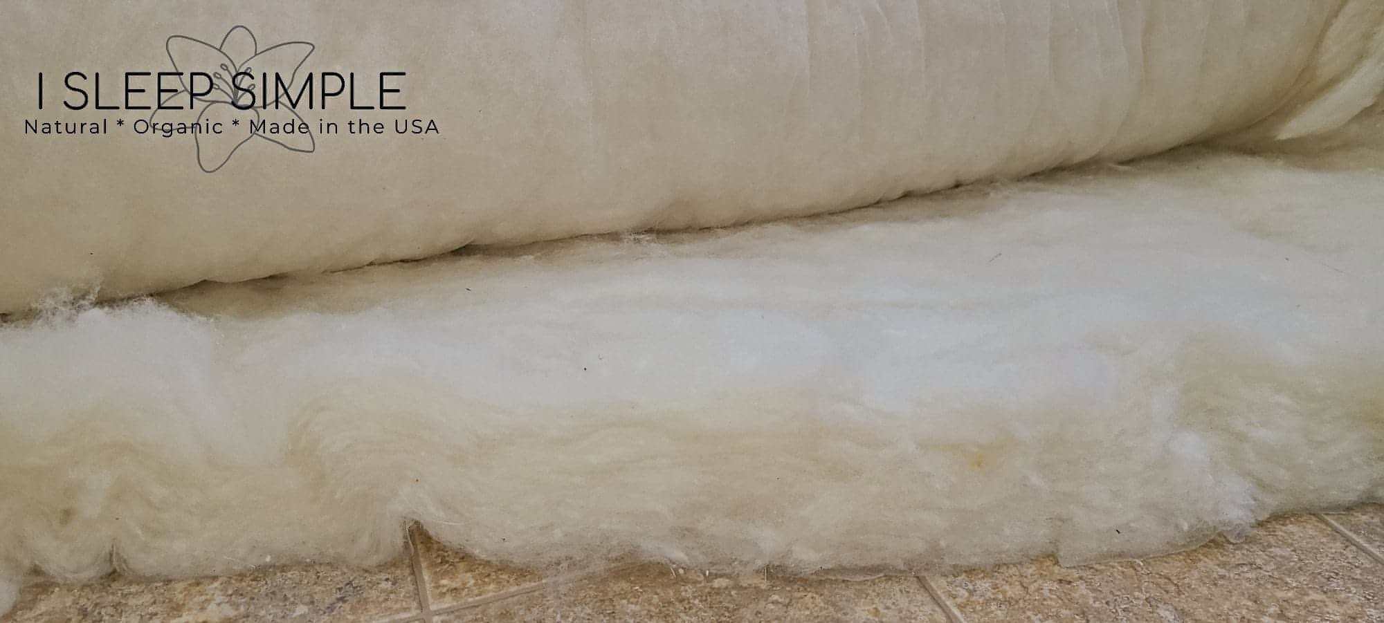 Organic wool batting roll, GOTS certified, natural and eco-friendly.