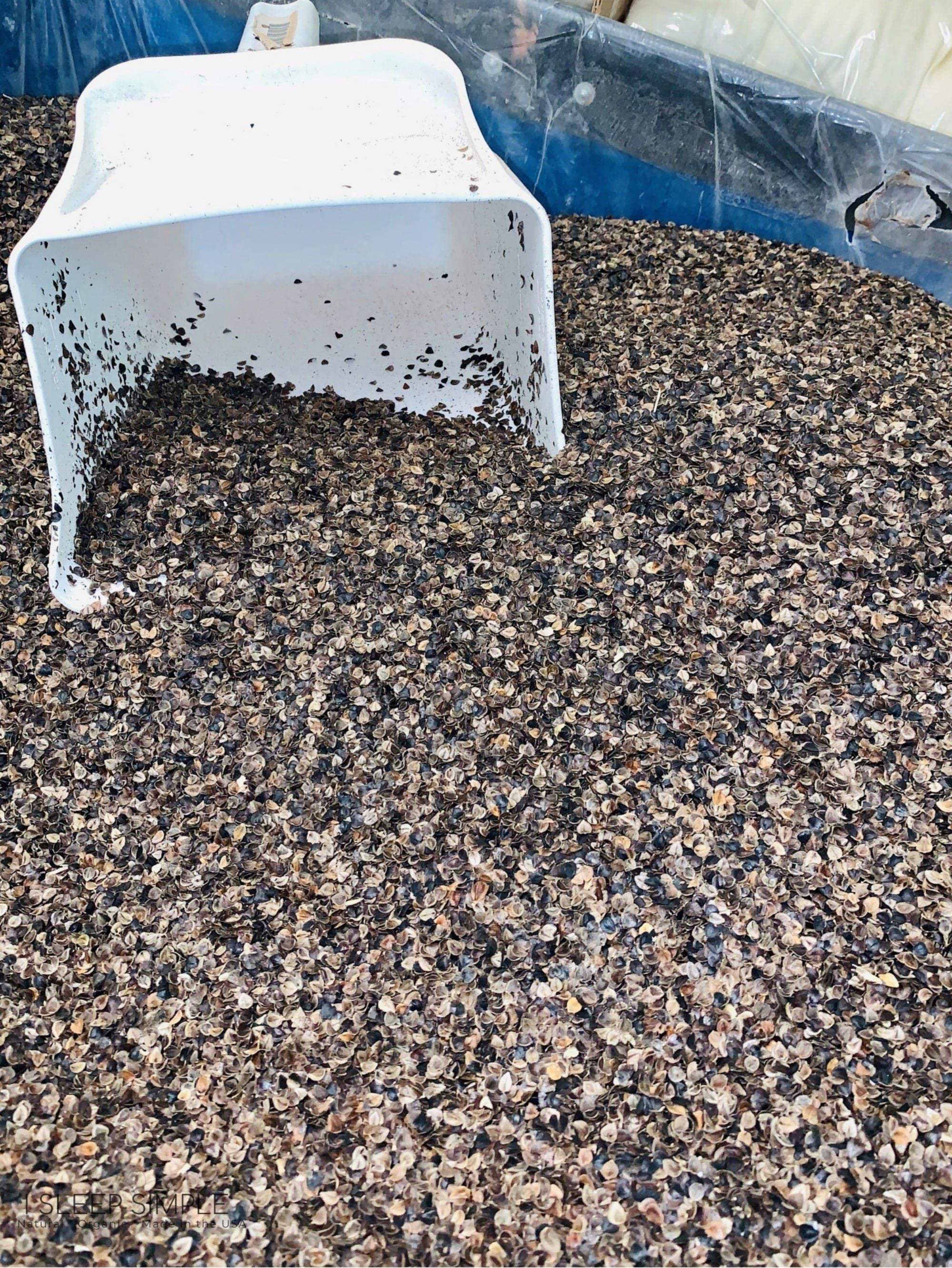 Buckwheat hulls with scoop, grown in the US, used for pillows and cushions.