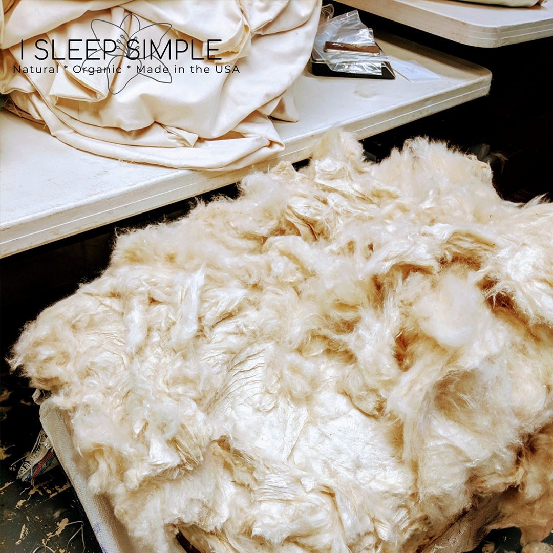 Natural kapok fiber filling for eco-friendly pillows and cushions, plant-based and vegan alternative to synthetic material.