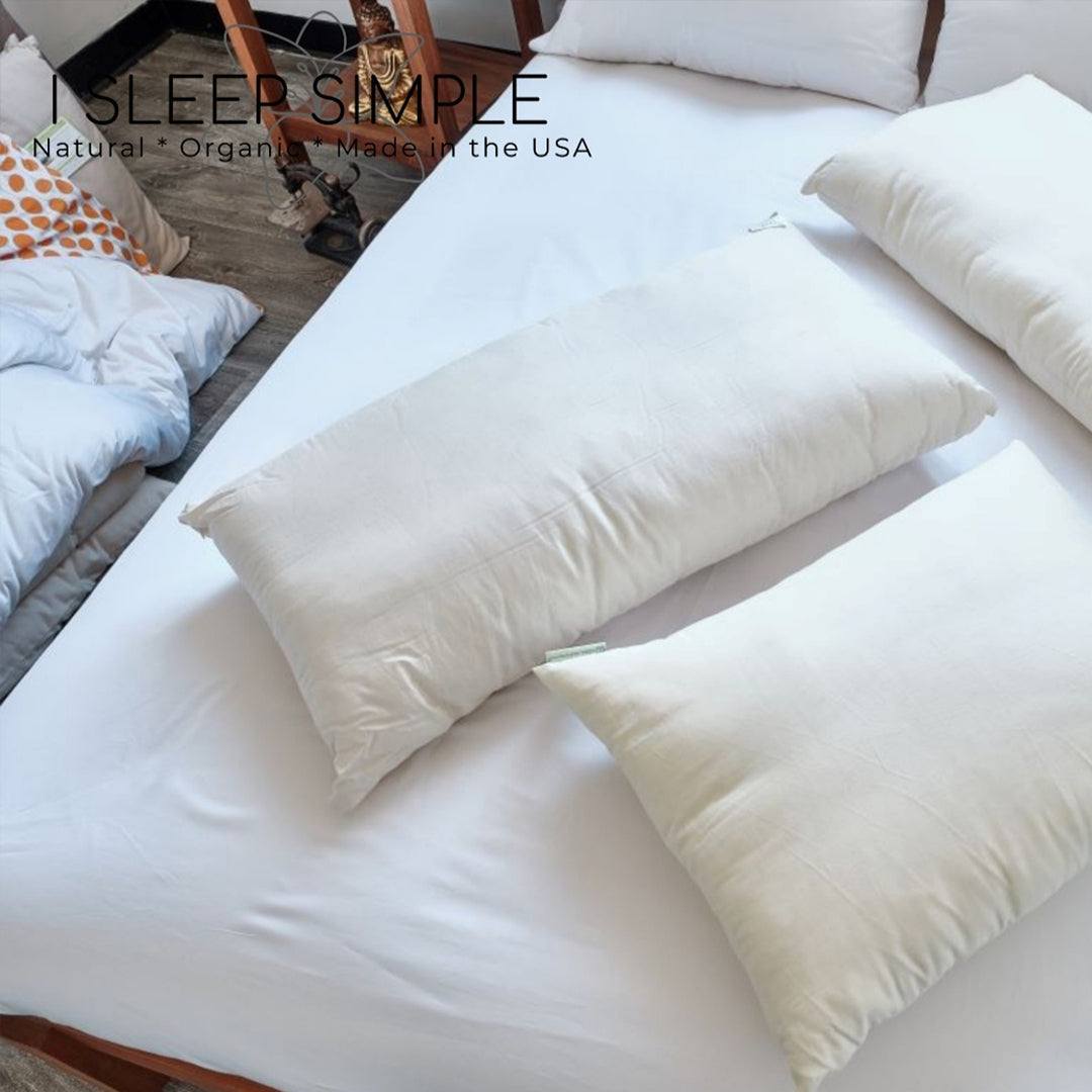 Luxury Best Kapok Pillow on a bed, eco-friendly sustainable comfort with organic cotton cover.