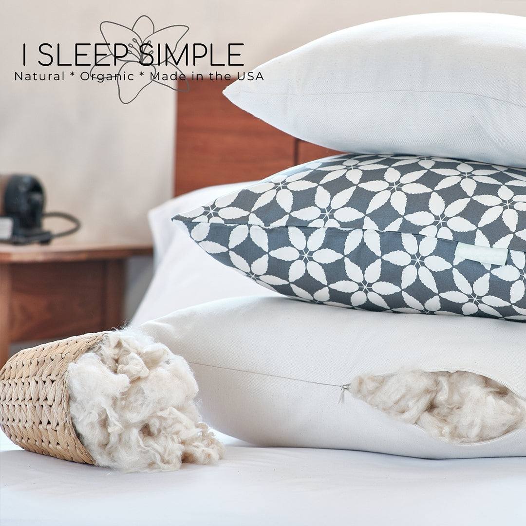 Kapok pillow with organic cotton cover in a bedroom setting, showcasing natural and sustainable filling.